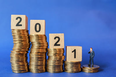 Stack of objects against blue background