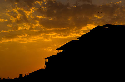 View of buildings at sunset