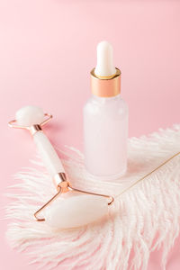 Close-up of dental equipment against pink background