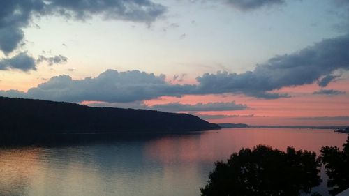 Scenic view of lake at sunset