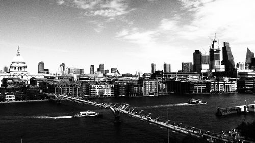 View of city buildings against sky