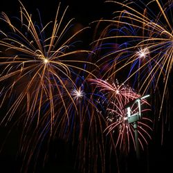 Low angle view of firework display