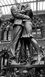 Low angle view of statue against building