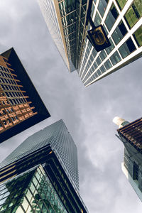Low angle view of modern buildings against sky