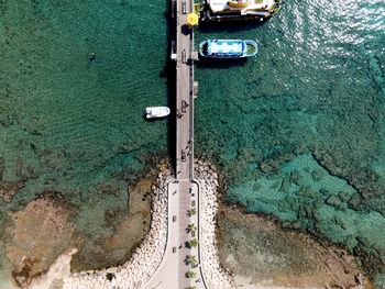 High angle view of boats moored on sea shore