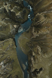 High angle view of rocks in river