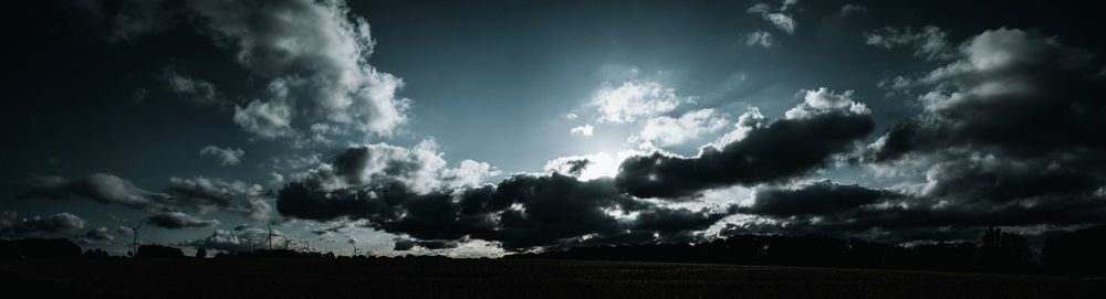 Panoramic view of storm clouds over land