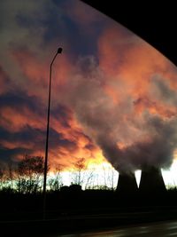 Low angle view of cloudy sky at sunset