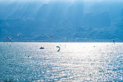 People swimming in sea
