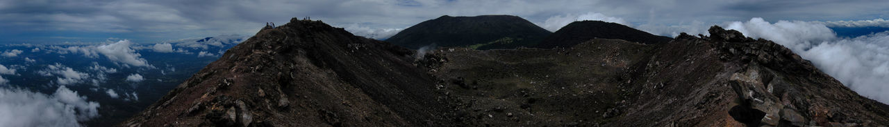 Panoramic view of rocks against sky