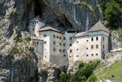 Low angle view of buildings against mountain