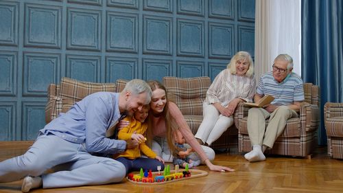 Portrait of family sitting at home