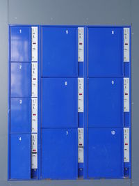 Close-up of blue lockers