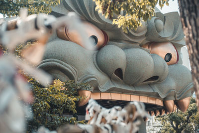 Close-up of statues for sale