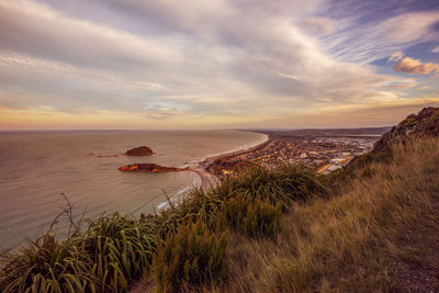 Scenic view of sea against sky during sunset