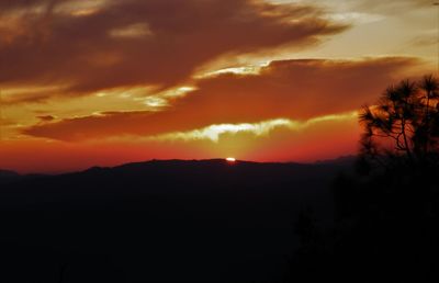 Scenic view of dramatic sky during sunset