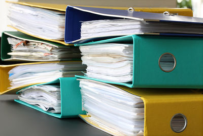 Close-up of papers on table