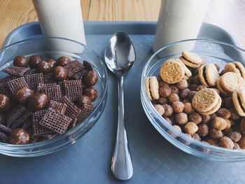 High angle view of cookies in bowls on table