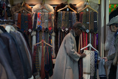 Clothes hanging in store for sale in market