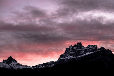 Low angle view of dramatic sky during sunset