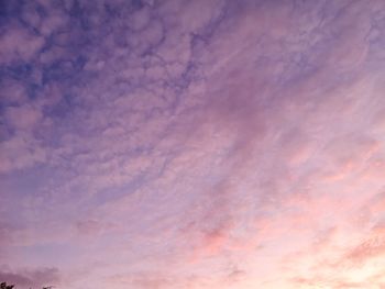 Low angle view of dramatic sky during sunset