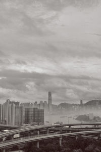High angle view of buildings in city against sky
