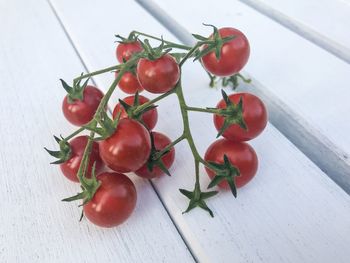 High angle view of small tomatoes on table