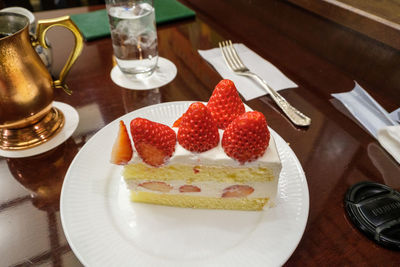 High angle view of cake served on table