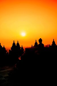 Silhouette of buildings during sunset