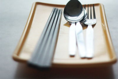 Close-up of spoon on table