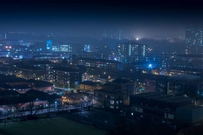 Illuminated cityscape at night