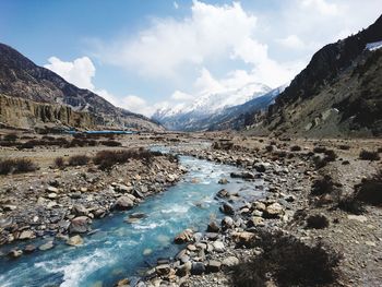 Panoramic view of lake and mountains against sky