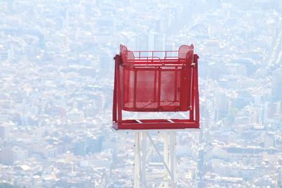 High angle view of red umbrella against wall