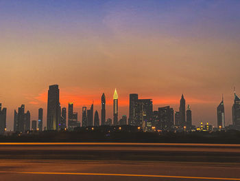 View of buildings against sky during sunset