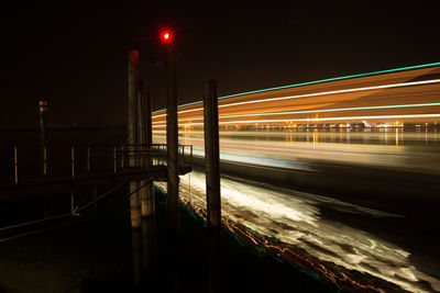 Light trails over lake maggiore at night