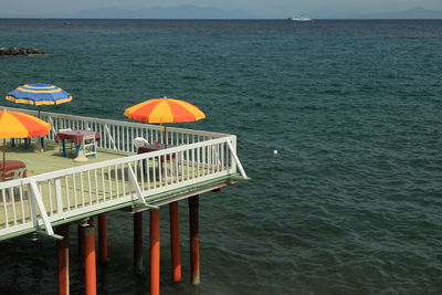 High angle view of pier over sea against sky