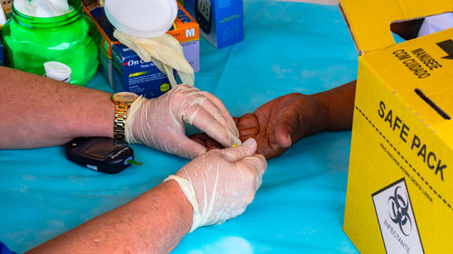 High angle view of people on hands