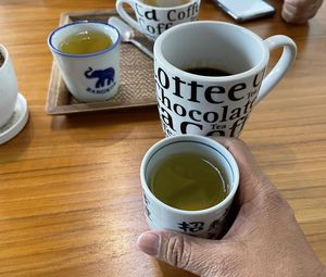 High angle view of coffee cup on table