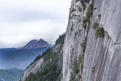 Two men hanging on portaledge on the squamish chief with garibaldi