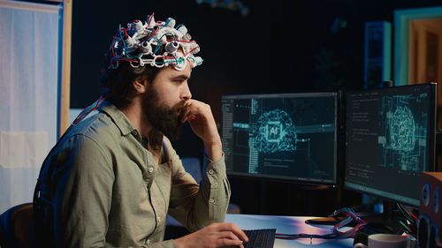 Portrait of young man working in office