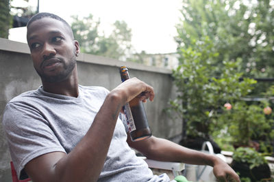 Young man enjoying a beer