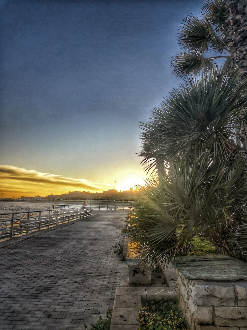 SCENIC VIEW OF BEACH DURING SUNSET