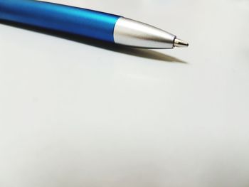 Close-up of pen on table