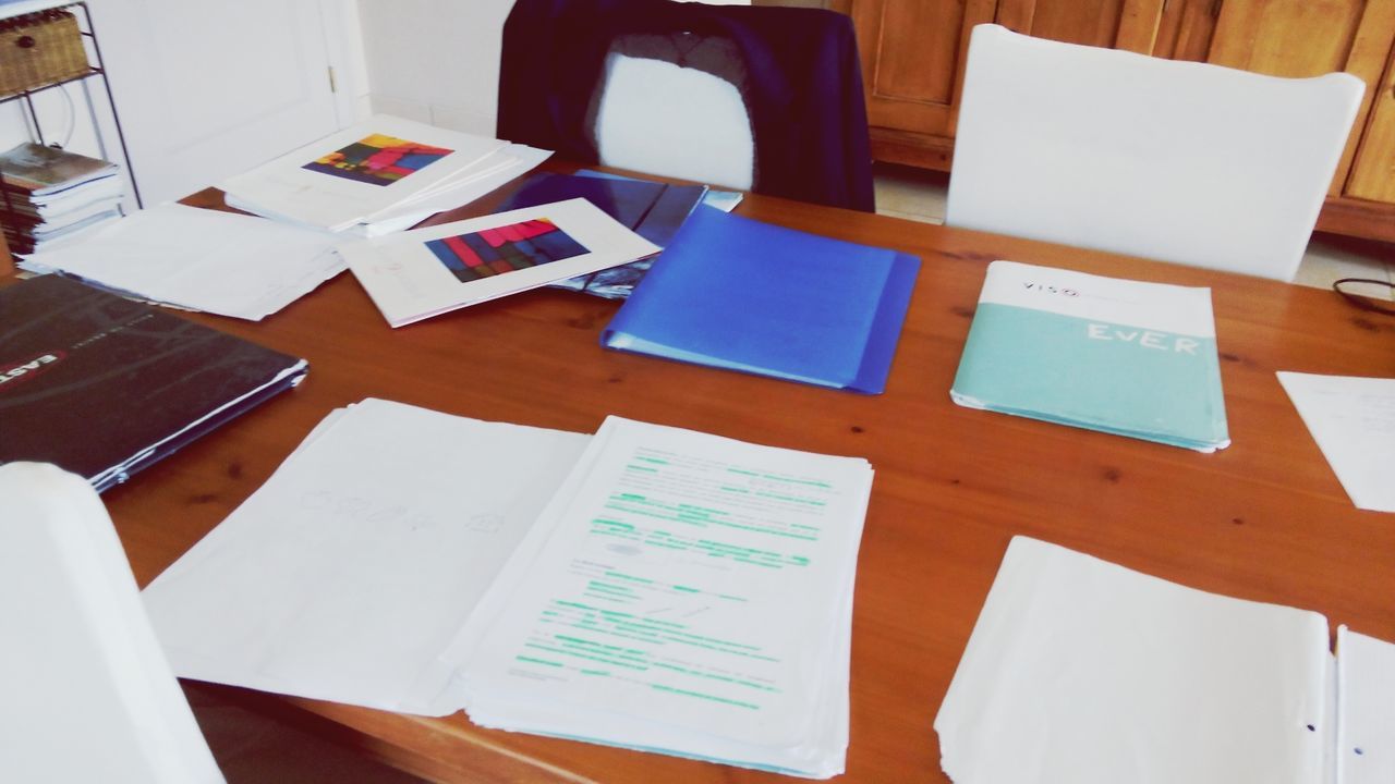 indoors, book, table, education, paper, communication, high angle view, still life, chair, desk, document, text, wood - material, empty, absence, page, pen, close-up, open, office