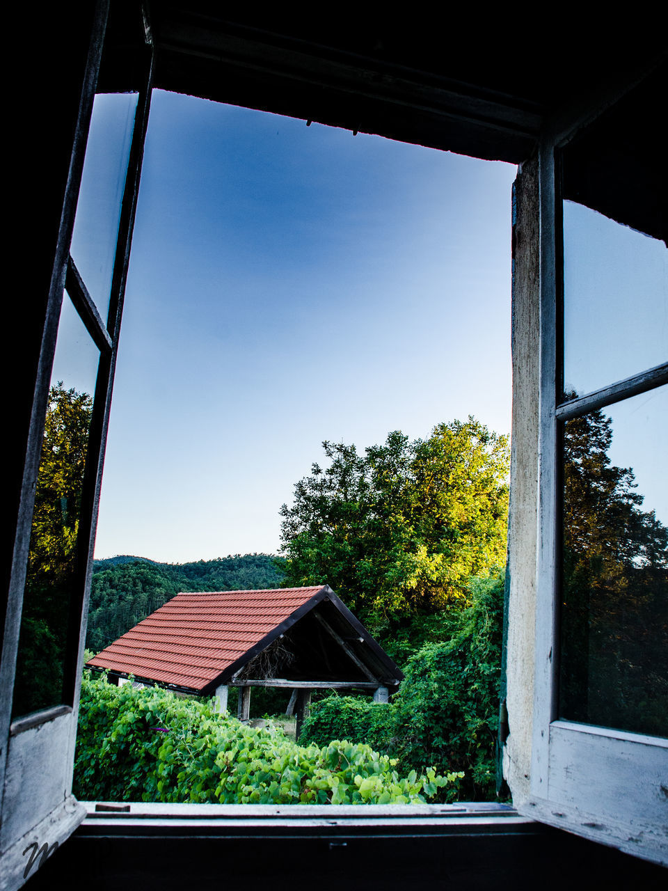 HOUSE AGAINST SKY