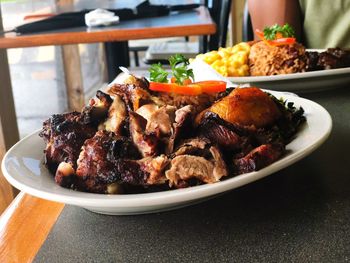 Close-up of meal served in plates on table