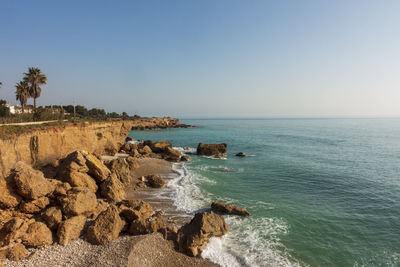 Scenic view of sea against clear sky