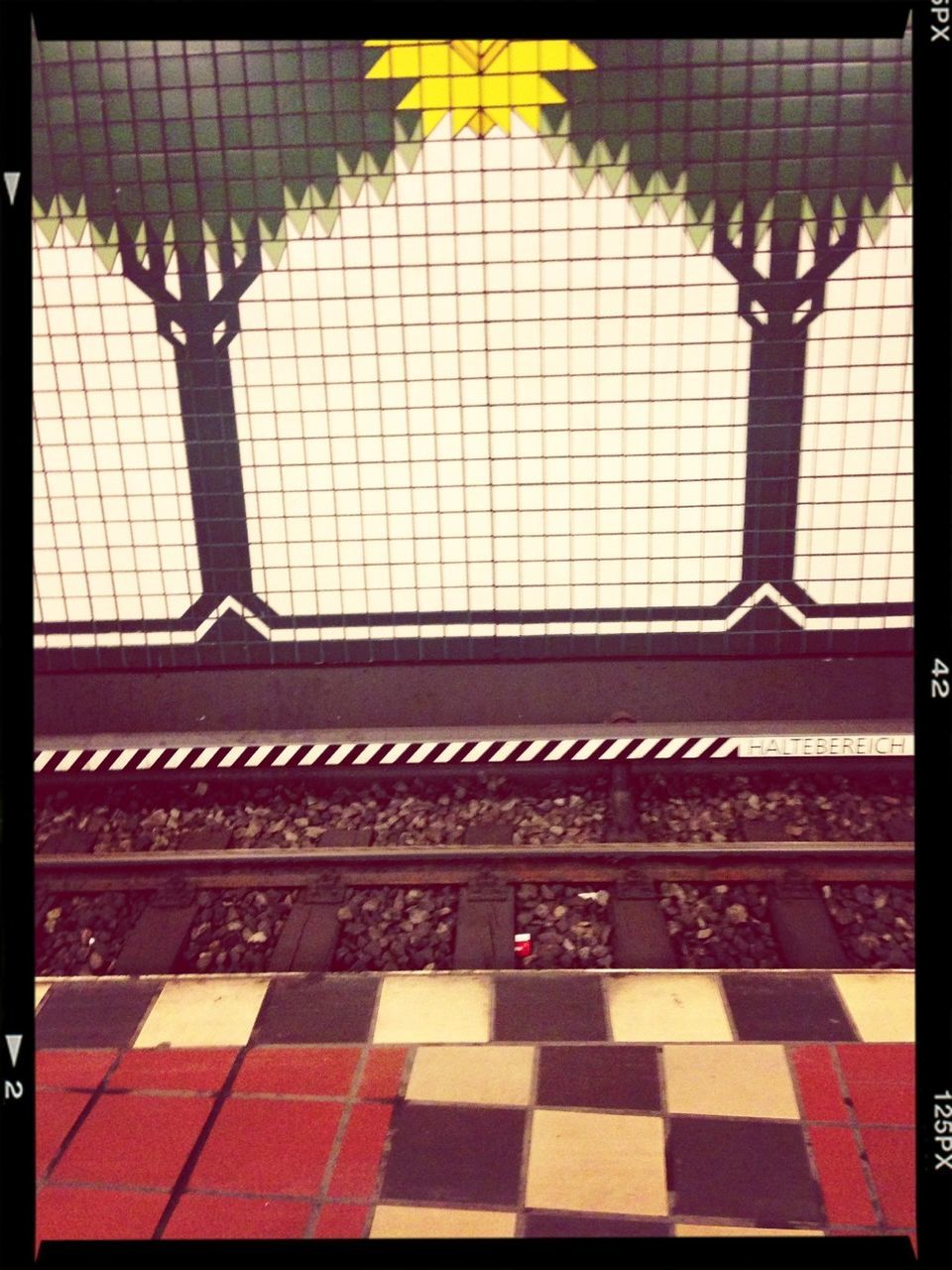 transfer print, auto post production filter, indoors, pattern, metal, protection, design, shadow, empty, red, railing, tiled floor, safety, high angle view, no people, in a row, day, absence, sunlight, wall - building feature