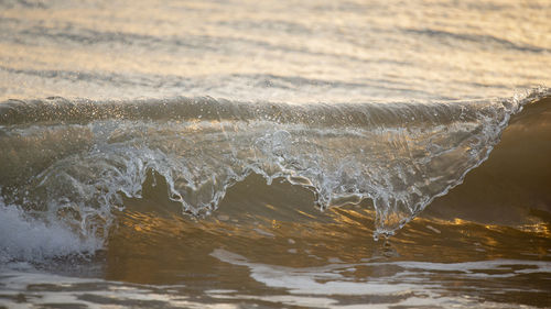 Close-up of splashing water in sea