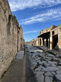 View of old ruin building against cloudy sky